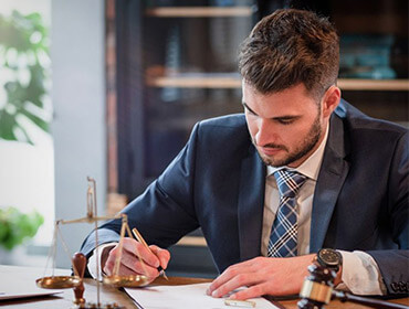 Business attorneys reviewing documents